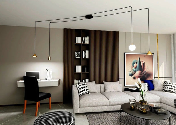 Plafond med gyllene upphängningar och svarta kablar - PlafondLjus