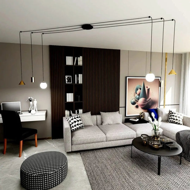 Plafond med gyllene upphängningar och svarta kablar - PlafondLjus