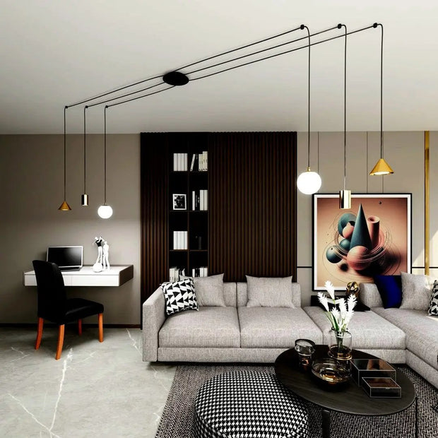 Plafond med gyllene upphängningar och svarta kablar - PlafondLjus